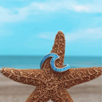 Ασημένιο δαχτυλίδι σε σχήμα κύματος με μπλε πέτρα