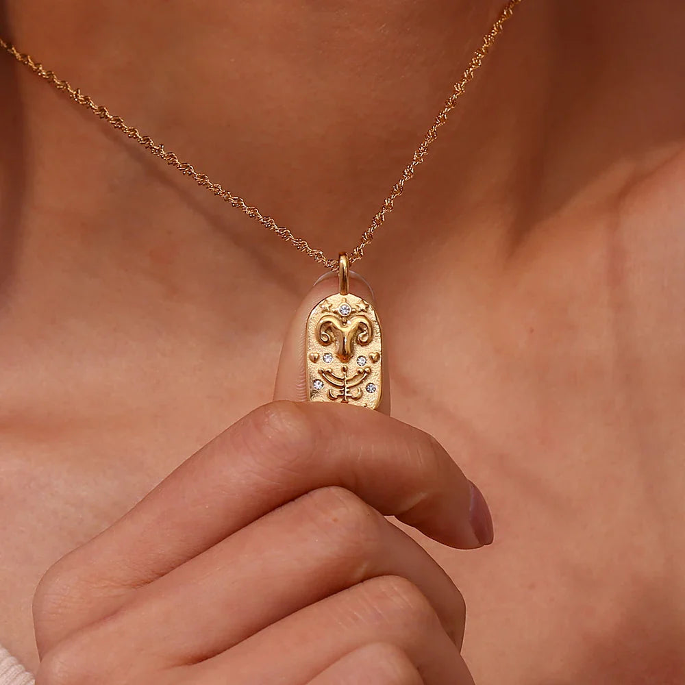 **Zodiac Charm Necklace**  
*Embrace your celestial essence with Clara's stunning Zodiac Charm Necklace, a personalized accessory that celebrates your unique astrological sign.*