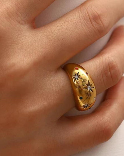 **Title:** "Axie Charm Ring"

**Description:** Meet Sofia, the embodiment of elegance; this Axie Charm Ring captures her vibrant spirit with a playful design that shines in any setting.