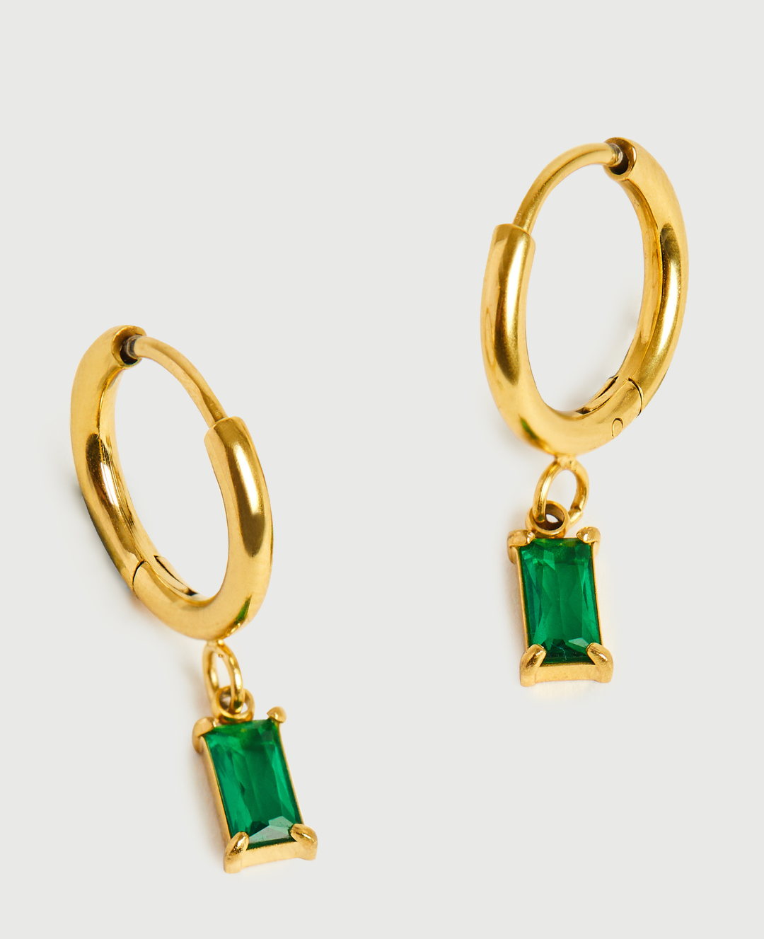 **Emerald Earrings - Sophia**  
Elevate your style with these stunning emerald earrings, perfect for adding a touch of elegance to any outfit.

**Emerald Dangles - Mia**  
Make a statement with these vibrant emerald dangles, designed for the bold and beau