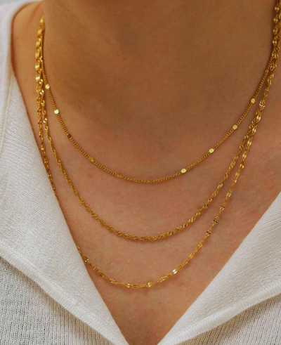 **Title:** Margot's Glam Necklace  
**Description:** An exquisite necklace that radiates elegance, perfect for adding a touch of sophistication to any outfit, just like Margot herself.
