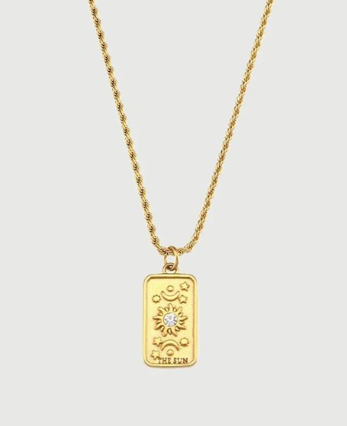 **Tarot Charm Necklace**  
Adriana loves wearing this enchanting piece that combines elegance with mystical allure. Perfect for those who believe in the magic of tarot!  

**Tarot Pendant Jewelry**  
Sophia adores her chic tarot pendant, a stylish way to