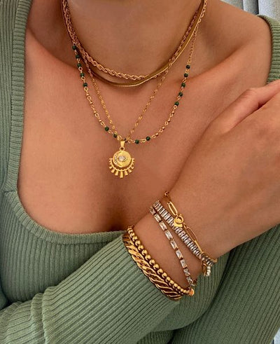 **Celia's Charm Bracelet**  
Elevate your style with Celia's Charm Bracelet, a stunning accessory that adds a touch of elegance to any outfit.  

**Maya's Gemstone Bangle**  
Discover Maya's Gemstone Bangle, a vibrant blend of colors that brings joy and p