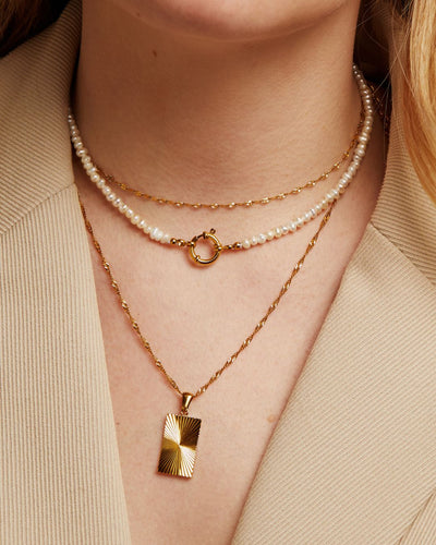 **Dazzling Necklace**  
Meet Lila, a stunning piece that adds brilliance to any outfit, perfect for those who love to shine.