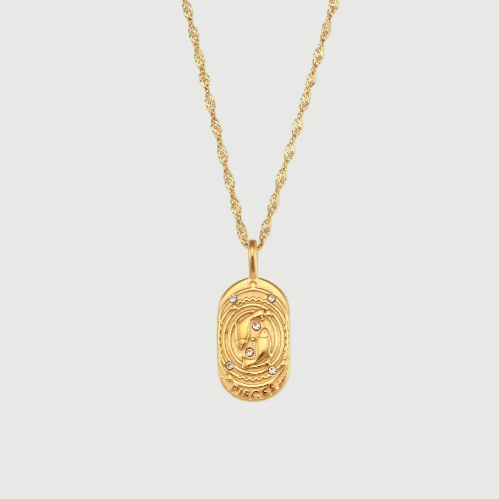 **Zodiac Charm Necklace**  
*Embrace your celestial essence with Clara's stunning Zodiac Charm Necklace, a personalized accessory that celebrates your unique astrological sign.*