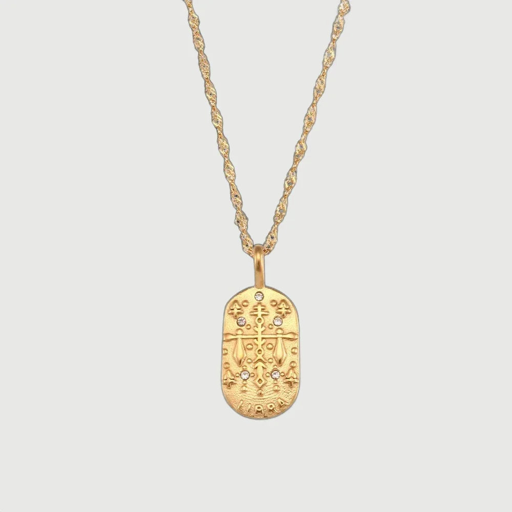 **Zodiac Charm Necklace**  
*Embrace your celestial essence with Clara's stunning Zodiac Charm Necklace, a personalized accessory that celebrates your unique astrological sign.*