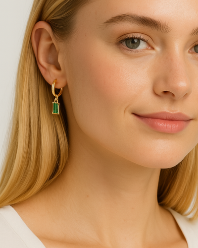 **Emerald Earrings - Sophia**  
Elevate your style with these stunning emerald earrings, perfect for adding a touch of elegance to any outfit.

**Emerald Dangles - Mia**  
Make a statement with these vibrant emerald dangles, designed for the bold and beau